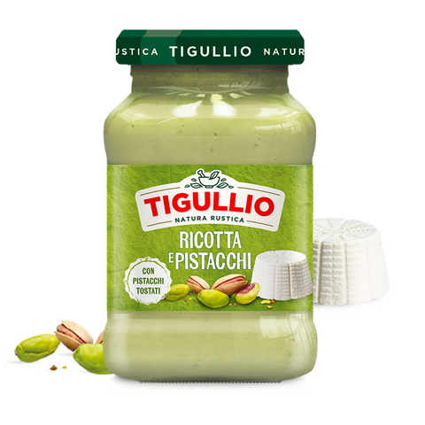 Tigullio Pesto Ricotta e Pistacchi 185 g, vasetto in vetro verde chiaro con pistacchi tostati